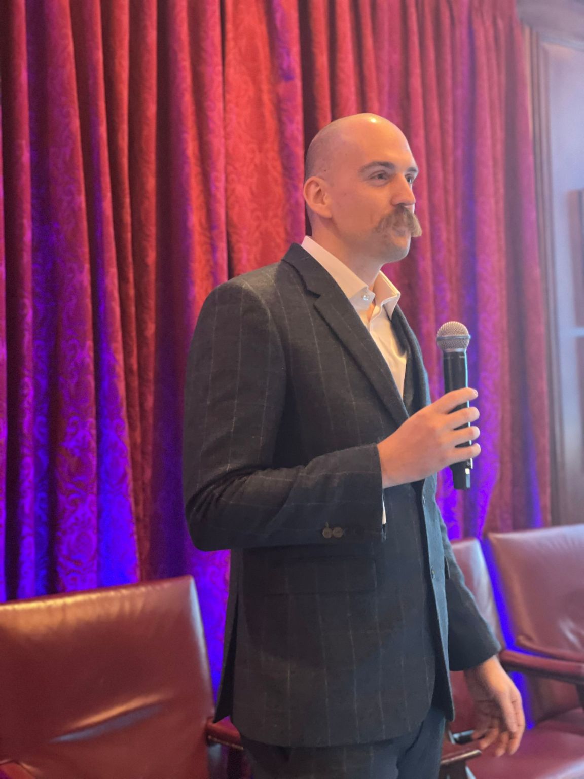 Luke speaking at the Harvard Club, New York